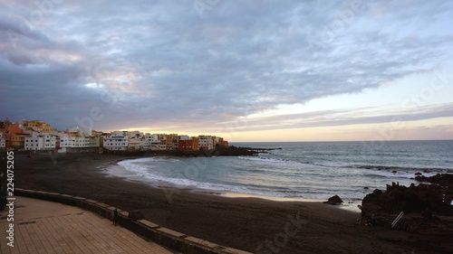 View of colourful houses of Punta Brava from Playa Jardin beach in Puerto de la Cruz  Tenerife  Canary Islands  Spain