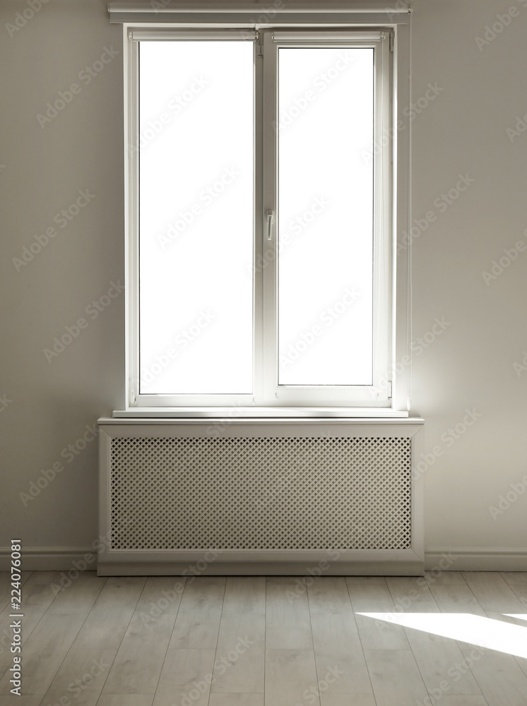 Fototapeta premium Light empty room with window. Home interior
