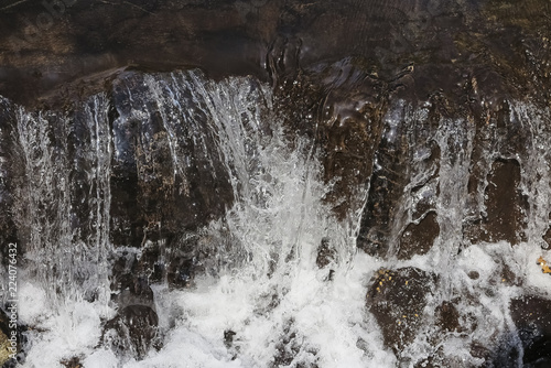 foreground of a small waterfall