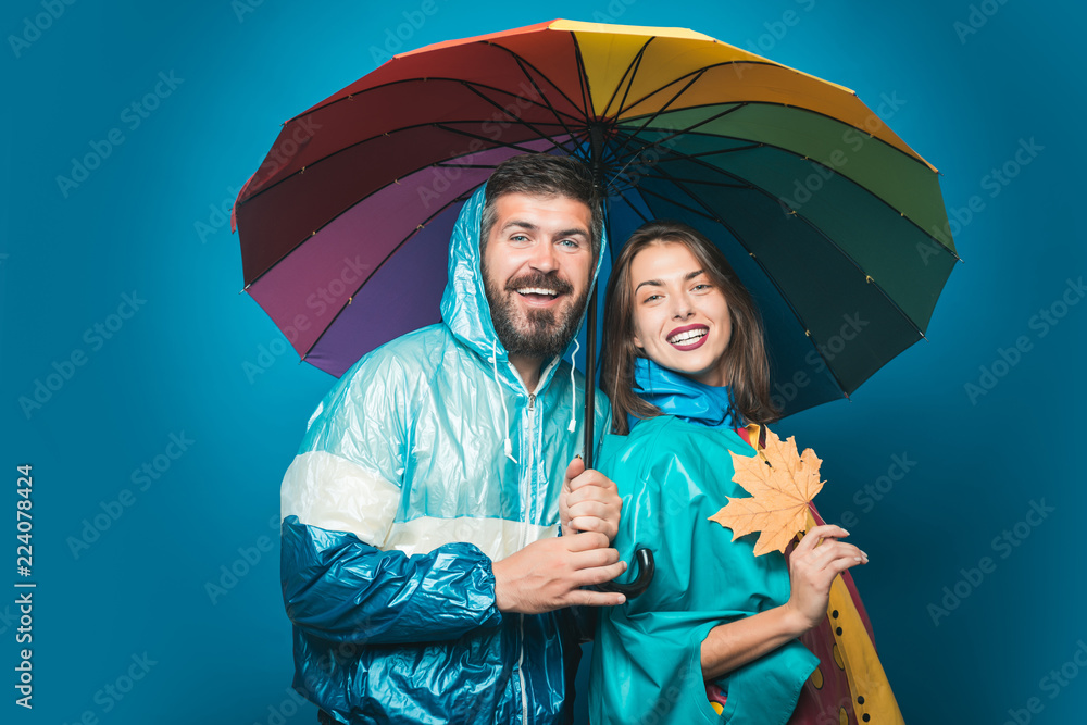 Surprised couple on autumn clothes discounts man with beard and