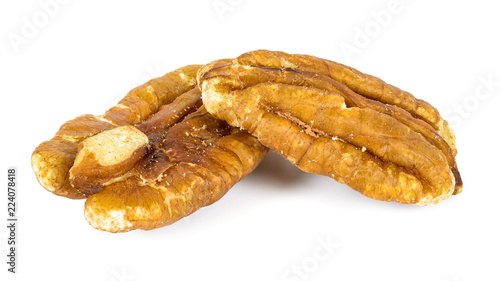 Close-up of pecan nuts isolated on white background