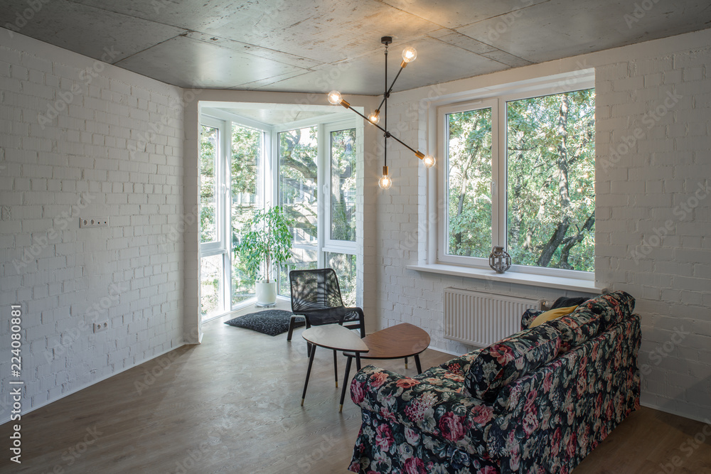 Fototapeta premium Rest zone in a modern apartment. Reading area in studio apartments. 