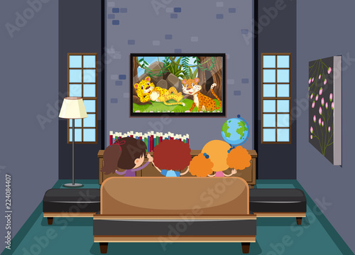 Children watching TV in living room