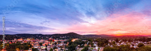 Aerial cityscape of Dover, New Jersey with dramatic sky at dusk. Dover has become a majority minority community, with 70 percent of the population identifying themselves as Hispanic.