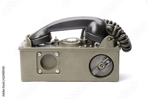 Old military field phone isolated on the White Blackground