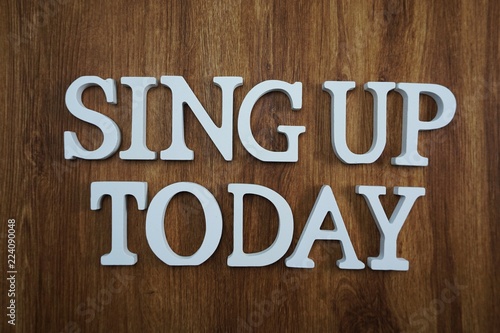 sing up today alphabet letters top view on wooden background © may1985