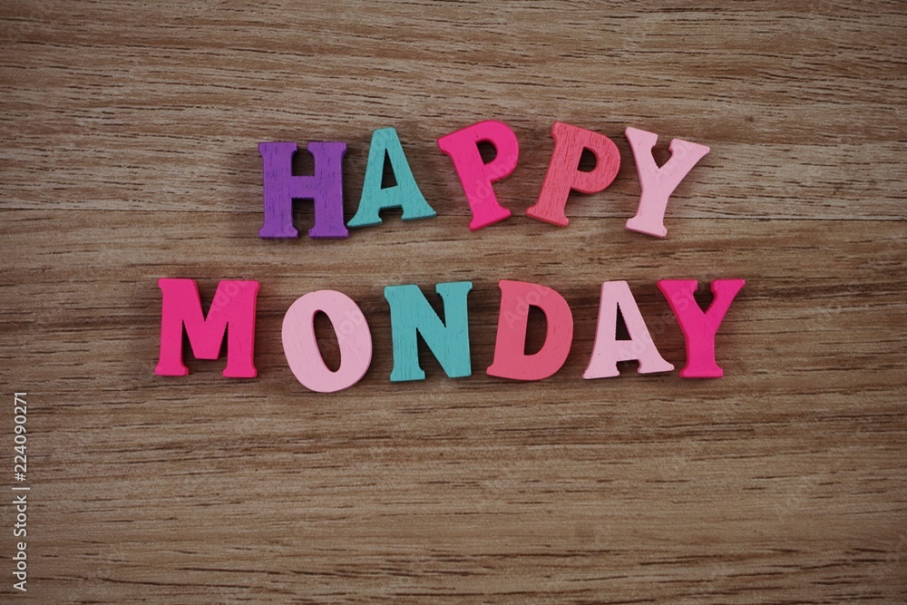 colorful happy monday alphabet letters on wooden background colorful happy monday alphabet letters on wooden background