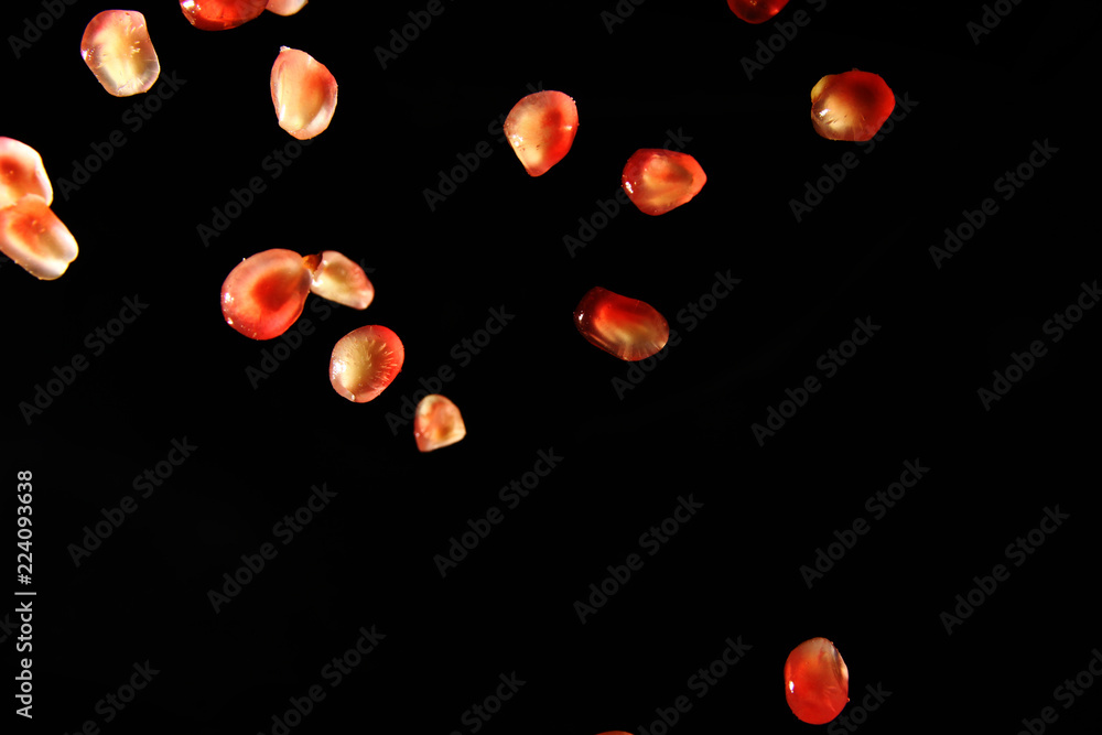Pomegranate seed on black background Pomegranate seed on black background