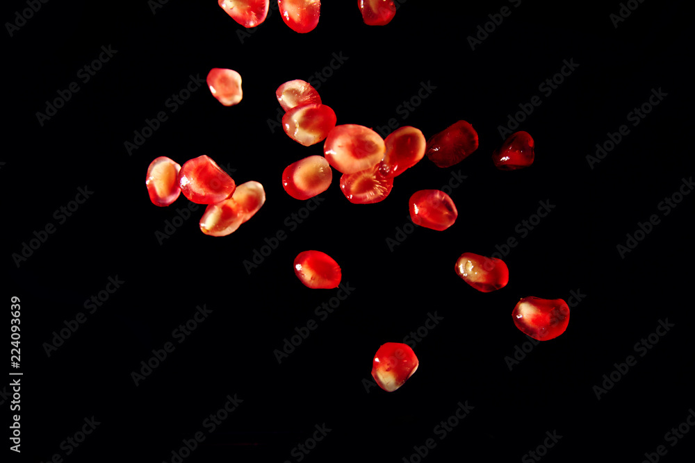 Pomegranate seed on black background Pomegranate seed on black background