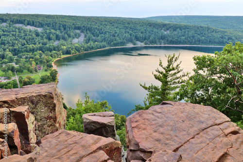 Beautiful Wisconsin nature background. Areal view on the South shore beach and lake from rocky ice age hiking trail. Devils Lake State Park, Baraboo area, Wisconsin, Midwest USA. photo