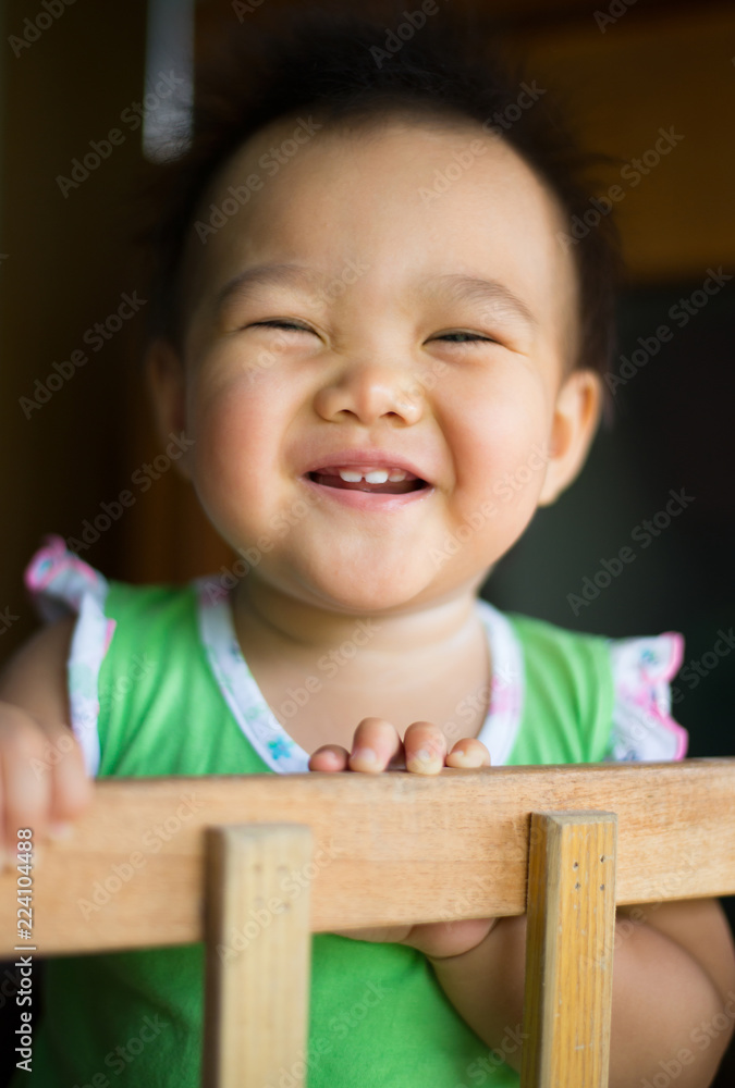 Asian children's faces are laughing happily. Asian children's faces are laughing happily.