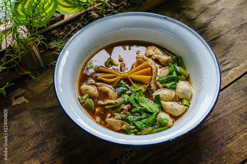 Thai rice noodle soup with pork and meatball. It is called 