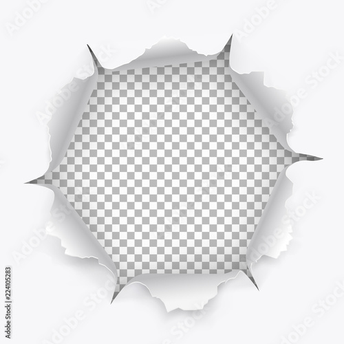 Torn hole in paper with ripped edges with shadow on transparent background. Graphic concept for your design.