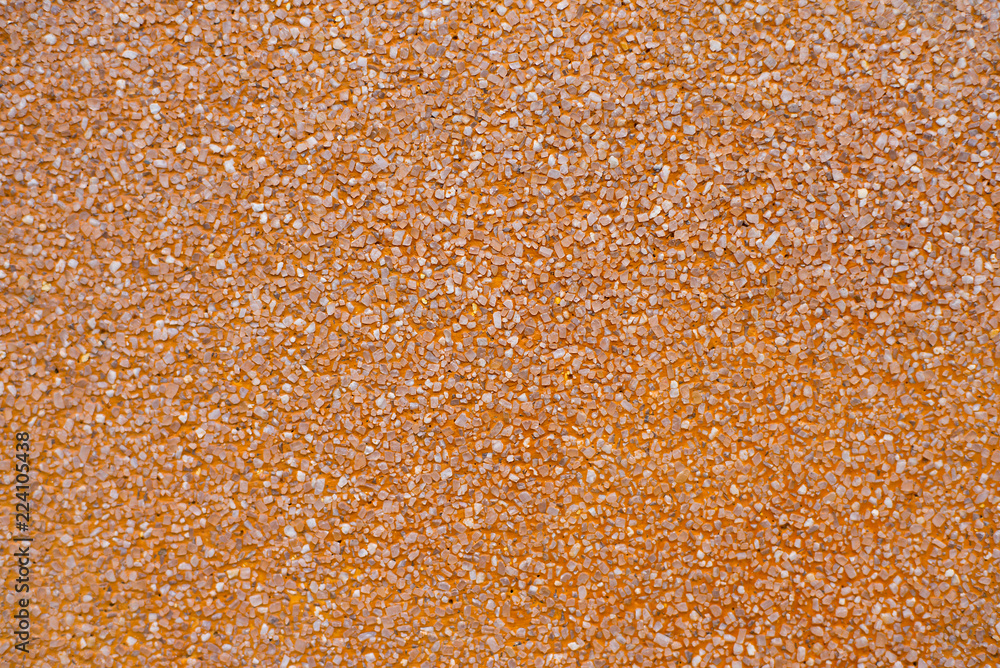 Surface and texture details of orange concrete floor. Surface and texture details of orange concrete floor.