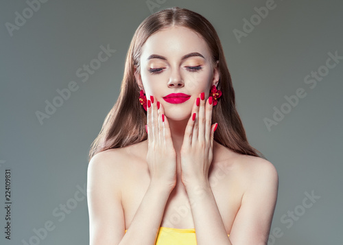 Beautiful woman with manicured nails beautiful hands and hairstyle