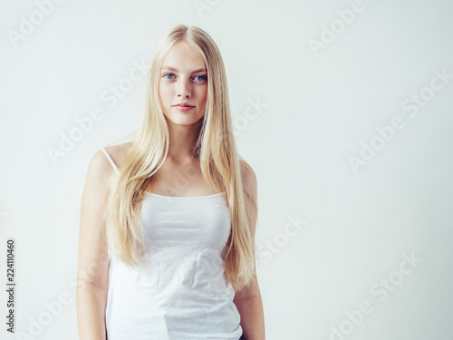 Blonde woman with long smooth hair natural portrait