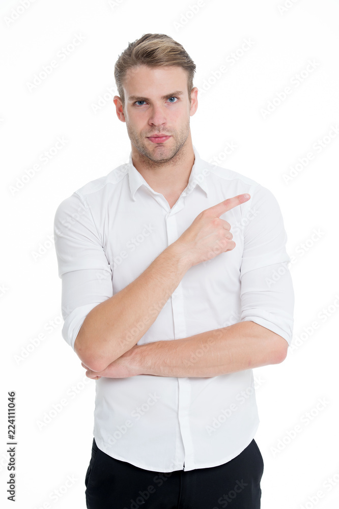 Pointing direction. Man shop assistant pointing index finger isolated on white. Manager or assistant help find direction. Guy handsome shows direction. Look at this advertisement. This way concept Pointing direction. Man shop assistant pointing index finger isolated on white. Manager or assistant help find direction. Guy handsome shows direction. Look at this advertisement. This way concept