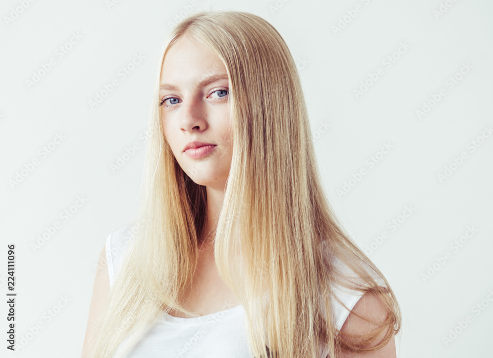 Beautiful blonde woman natural portrait with long blonde smooth hair Beautiful blonde woman natural portrait with long blonde smooth hair