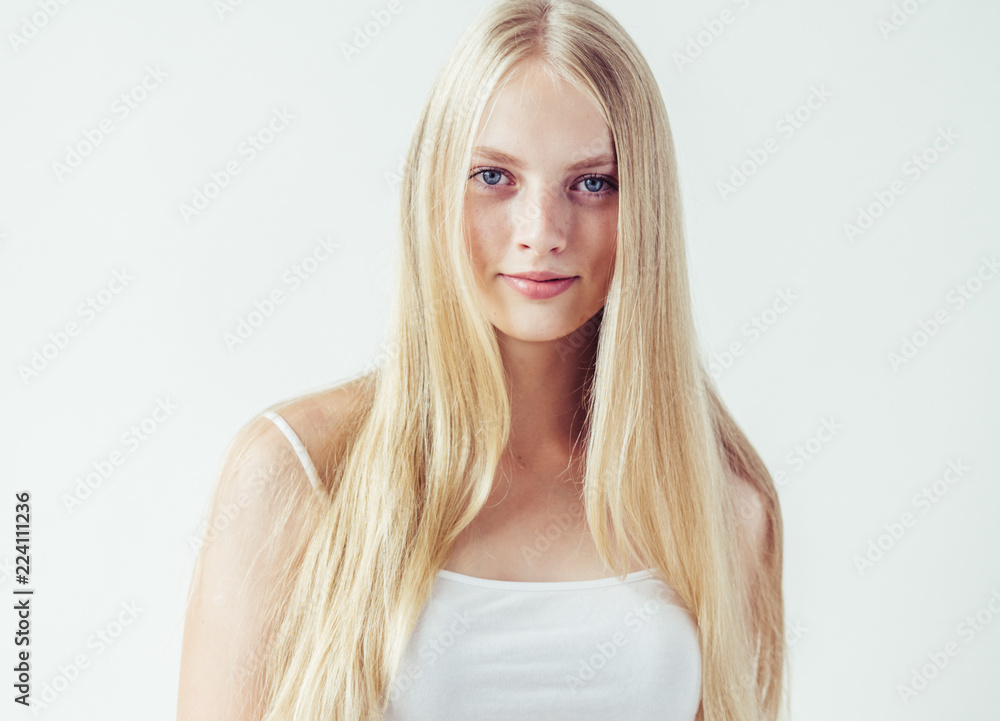 Beautiful blonde woman natural portrait with long blonde smooth hair Beautiful blonde woman natural portrait with long blonde smooth hair