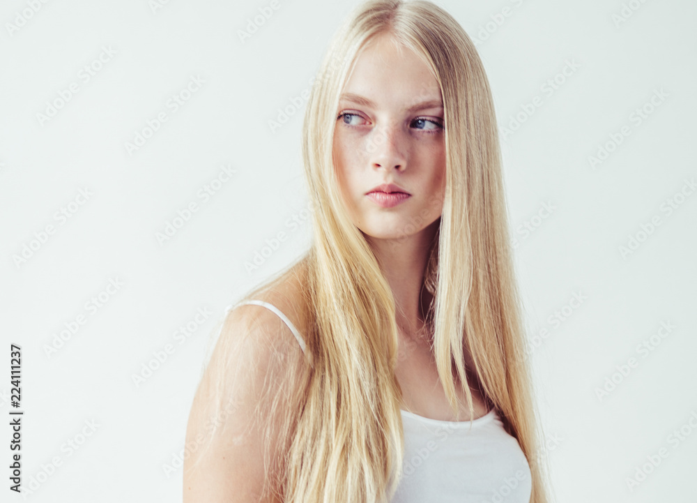 Beautiful blonde woman natural portrait with long blonde smooth hair Beautiful blonde woman natural portrait with long blonde smooth hair