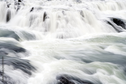 Gullfoss waterfall located in canyon river southwest Iceland. Water stream flow. Waterfall nature landscape. Tourist destinations concept. Waterfall popular tourist attraction. River rapid waterfall