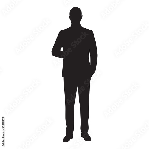 Businessman isolated vector silhouette. Man in suit standing with hand in pocket, front view © michalsanca