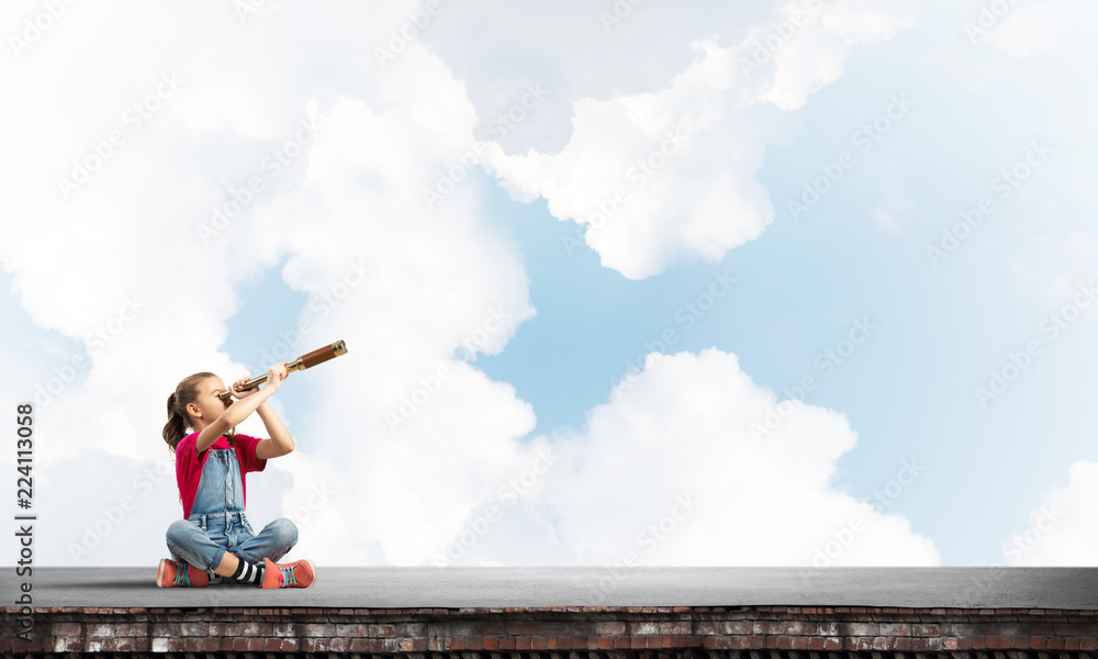Concept of careless happy childhood with girl exploring this world Concept of careless happy childhood with girl exploring this world