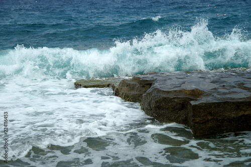 sea surf on stone photo