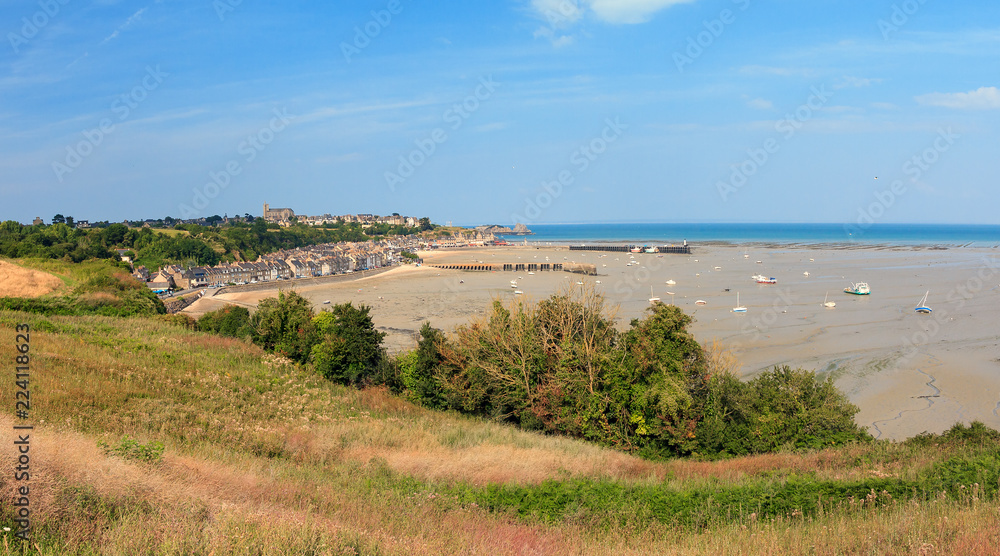 Beautiful cityscape view of the skyline and beach at low tide of the city Cancale, France, in summer Beautiful cityscape view of the skyline and beach at low tide of the city Cancale, France, in summer