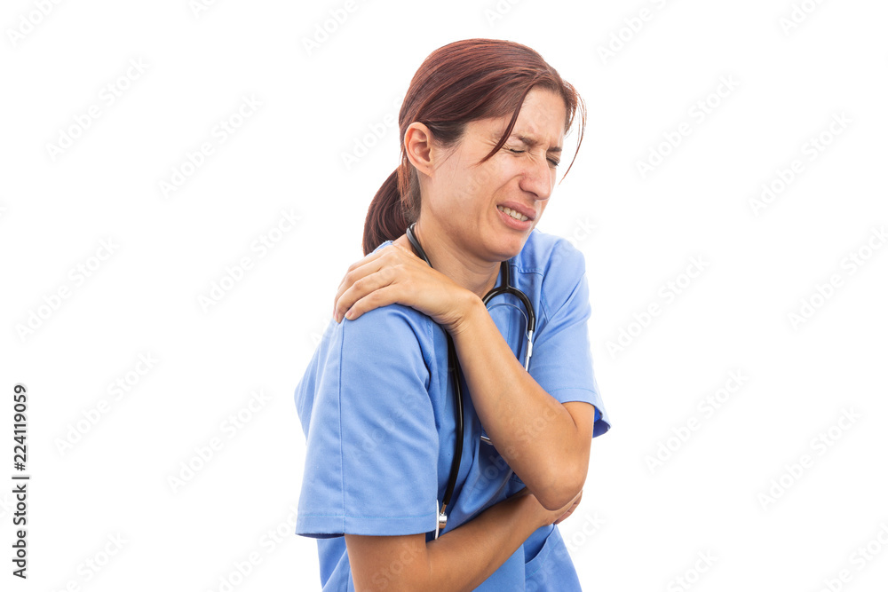 Injured hospital woman nurse or doctor holding painful shoulder. Injured hospital woman nurse or doctor holding painful shoulder.