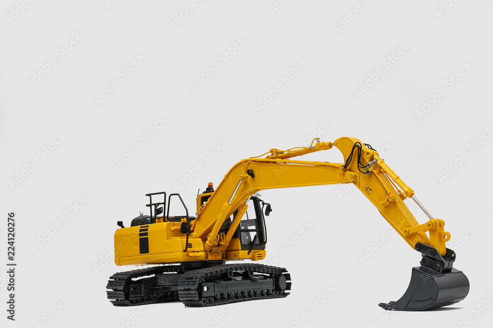 Excavator loader model with new modern technology on white background Excavator loader model with new modern technology on white background