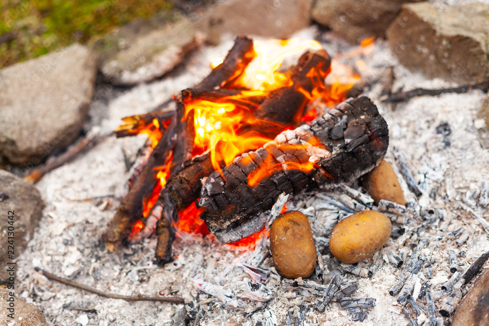 potatoes on a fire