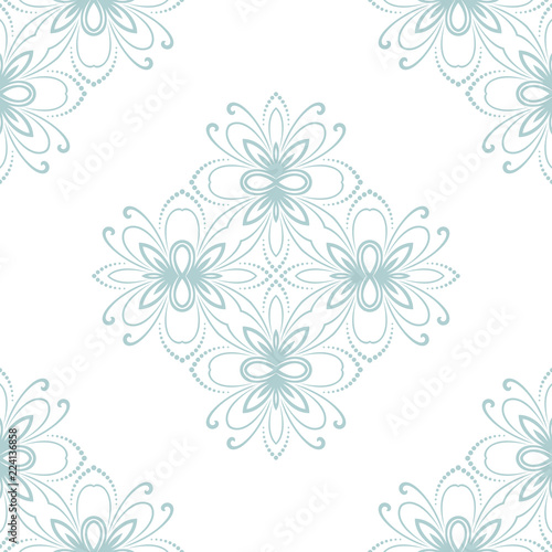 Floral vector ornament. Seamless abstract classic background with flowers. Light blue and white pattern with repeating floral elements. Ornament for fabric, wallpaper and packaging