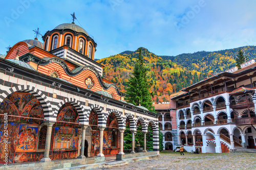 Beautiful view of the Orthodox Rila Monastery, a famous tourist attraction and cultural heritage monument in the Rila Nature Park mountains in Bulgaria photo