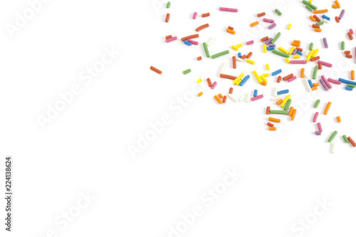 candy sprinkles confetti on white background photo