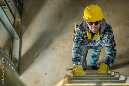 Contractor on a Ladder