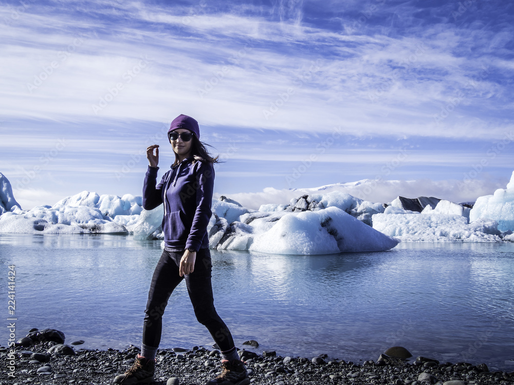Woman enjoying the view in Jokulsarlon Glacier Lagoon in Iceland