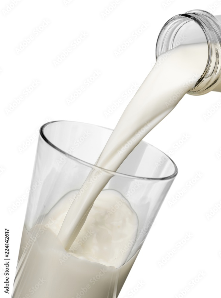 Pouring Milk in Glass Pouring Milk in Glass
