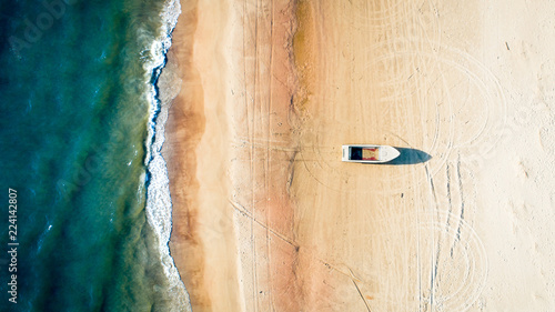 Canvas Print Boat on the Beach, Aerial Vertical Top Down View