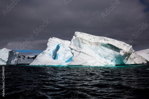 ice in the Antarctica with iceberg in the ocean © sarah