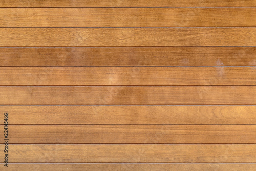 smooth surface of the varnished planks of precious wood