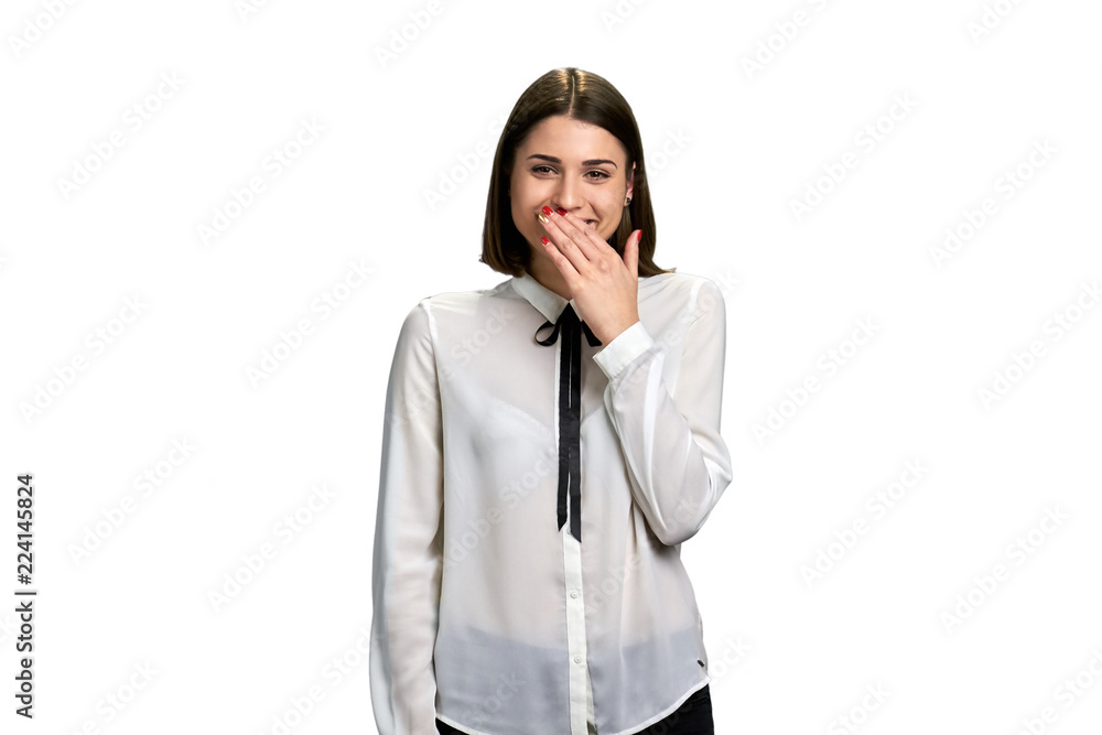 Smiling girl isolated on white background. Pretty caucasian woman covering mouth with hand and smiling. Smiling girl isolated on white background. Pretty caucasian woman covering mouth with hand and smiling.