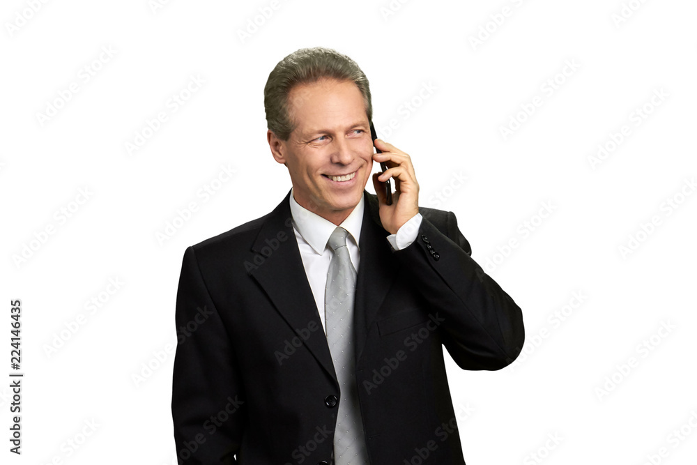 Smiling entrepreneur talking on smartphone. Portrait of happy mature businessman talking on cell phone, isolated on white background. Smiling entrepreneur talking on smartphone. Portrait of happy mature businessman talking on cell phone, isolated on white background.
