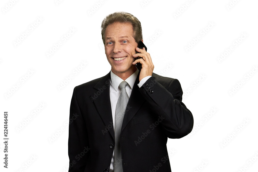 Portrait of happy businessman talking on phone. Surprised company leader talking on mobile phone isolated on white background. Portrait of happy businessman talking on phone. Surprised company leader talking on mobile phone isolated on white background.