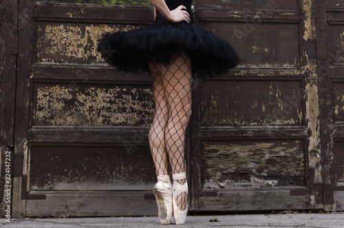 Legs of adult ballerina photo