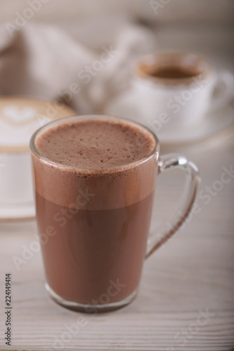 Glass mug with cocoa
