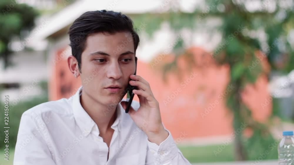 31_Portrait of a Attractive Young Man Talking with Phone 31_Portrait of a Attractive Young Man Talking with Phone