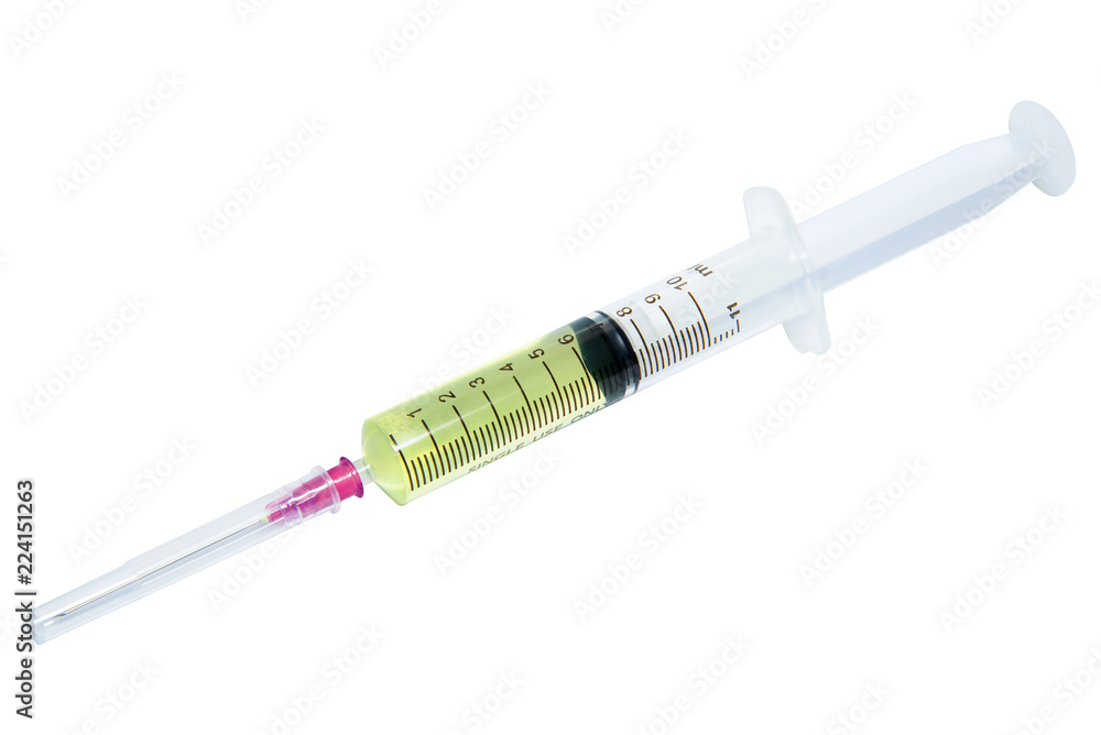 Fototapeta premium Plastic syringe with yellow liquid on white background.