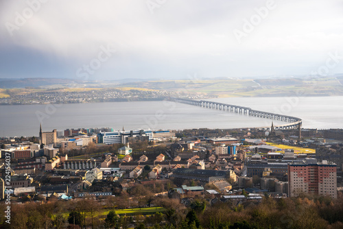 View of Dundee City Centre and the Railway Bridge Across the Firth of Tay During Heavy Rainfall in Winter