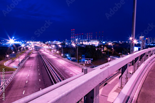 Large road junction iin the city in night lights photo